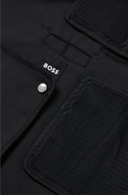 DOG RAINCOAT IN WATERPROOF FABRIC WITH CONTRAST LOGO